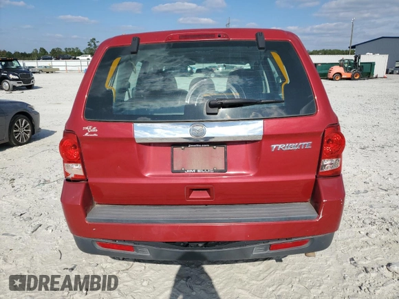 2011 Mazda Tribute Touring with VIN 4F2CY0C7XBKM00671, listed as a Copart auction lot 75431144 with 140,748 mi miles and Clean Title. Bid and sale history available at carsss.com. Image 6.
