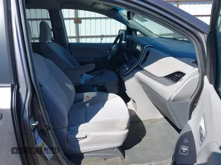 2016 Toyota Sienna LE with VIN 5TDJK3DC9GS130774, listed as a IAAI auction lot 42033495 with 228,289 mi miles. Bid and sale history available at carsss.com. Image 5.