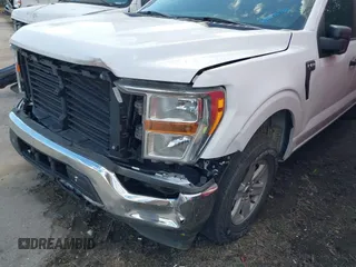 2021 Ford F-150 XL with VIN 1FTFW1E82MKD23506, listed as a IAAI auction lot 41876760 with 71,387 mi miles. Bid and sale history available at carsss.com. Image 13.