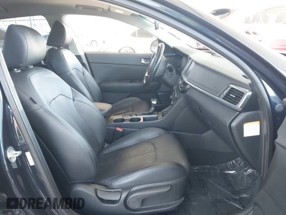 2017 Kia Optima EX with VIN KNAGU4LE8H5013625, listed as a IAAI auction lot 42001491 with 89,200 mi miles and . Bid and sale history available at DreamBid. Image 5.