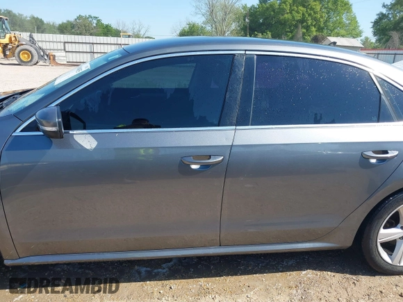 2015 Volkswagen Passat 1.8T Wolfsburg Ed with VIN 1VWAT7A3XFC115934, listed as a IAAI auction lot 41948035 with 243,143 mi miles. Bid and sale history available at carsss.com. Image 15.