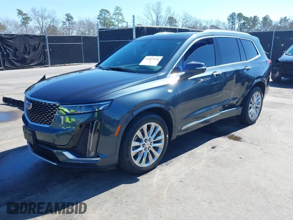 2021 Cadillac XT6 Premium Luxury with VIN 1GYKPERS0MZ110029, listed as a IAAI auction lot 41669104 with 58,890 mi miles and . Bid and sale history available at DreamBid. Image 2.