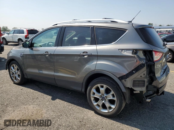 2014 Ford Escape Titanium с VIN 1FMCU0J96EUD41199, выставлен на аукционе Copart как лот 59380245 с пробегом 100 319 миль миль и Списание • Salvage title. История ставок и продаж доступна на DreamBid. Изображение 2.