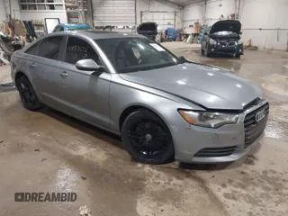 2013 Audi A6 2.0T Premium Plus with VIN WAUDFAFC6DN129440, listed as a IAAI auction lot 41853676 with 121,508 mi miles. Bid and sale history available at carsss.com. Image 1.