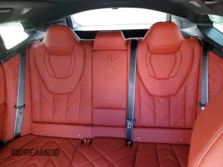 2023 BMW XM z VIN 5YM23CS0XP9S31984, wystawiony jako Copart lot #77081273 z przebiegiem 890 mil mil oraz . Historia ofert i sprzedaży dostępna na DreamBid. Obrazek 10.