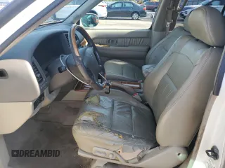2003 Infiniti QX4 with VIN JNRDR09X33W250292, listed as a Copart auction lot 56020474 with 260,391 mi miles and Clean Title. Bid and sale history available at DreamBid. Image 7.