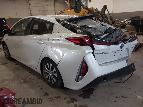 2022 Toyota Prius LE with VIN JTDKAMFP4N3223259, listed as a IAAI auction lot 41975054 with 49,558 mi miles and . Bid and sale history available at DreamBid. Image 3.