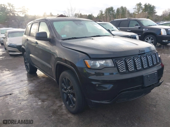 2021 Jeep Grand Cherokee Laredo X with VIN 1C4RJFAG6MC599672, listed as a IAAI auction lot 41323741 with 71,491 mi miles. Bid and sale history available at carsss.com. Image 13.