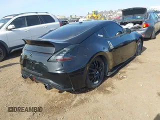 2009 Nissan 370Z Touring with VIN JN1AZ44E39M408668, listed as a IAAI auction lot 41231840 with 93,826 mi miles and . Bid and sale history available at DreamBid. Image 4.