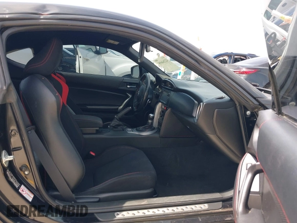 2014 Scion FR-S z VIN JF1ZNAA10E8703778, wystawiony jako IAAI lot #42264695 z przebiegiem 117 889 mil mil oraz . Historia ofert i sprzedaży dostępna na DreamBid. Obrazek 5.