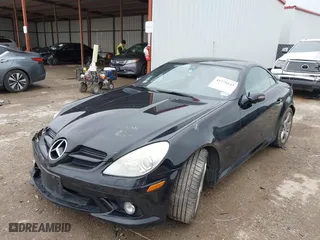 2006 Mercedes-Benz SLK-Class 3.5L with VIN WDBWK56FX6F084328, listed as a IAAI auction lot 41570145 with 104,929 mi miles. Bid and sale history available at carsss.com. Image 2.