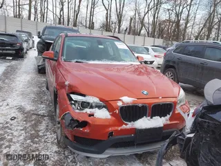 2015 BMW X1 xDrive28i with VIN WBAVL1C51FVY33650, listed as a IAAI auction lot 41400985 with 132,484 mi miles. Bid and sale history available at carsss.com. Image 13.