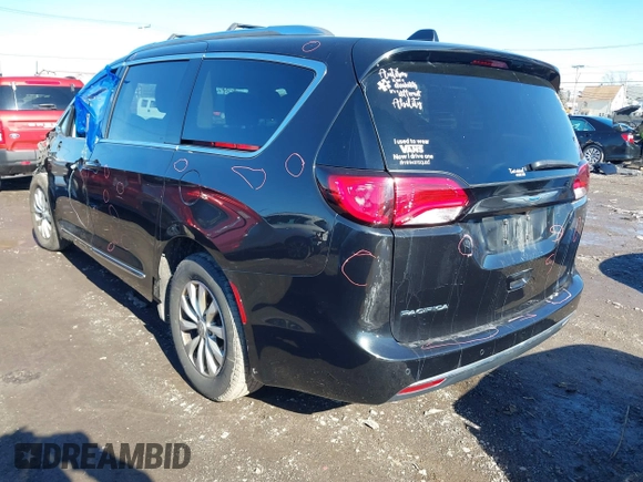 2018 Chrysler Pacifica Touring L with VIN 2C4RC1BGXJR157184, listed as a IAAI auction lot 41803388 with 102,095 mi miles and . Bid and sale history available at DreamBid. Image 3.