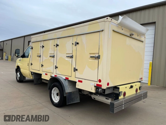 2021 Ford Econoline Cargo with VIN 1FDXE4FN8MDC34245, listed as a Copart auction lot 52241605 with 70,916 mi miles and Clean Title. Bid and sale history available at DreamBid. Image 3.