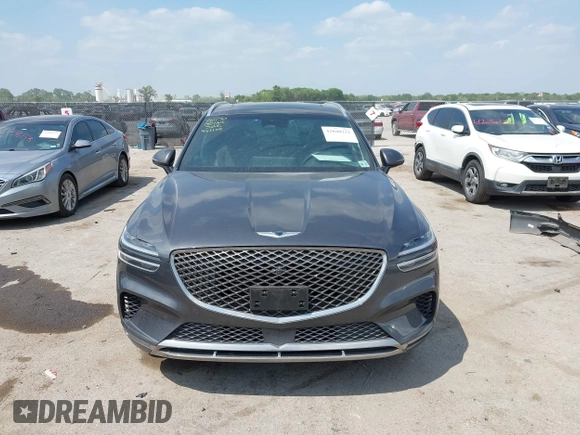 2023 Genesis GV70 2.5T with VIN KMUMADTB9PU084936, listed as a IAAI auction lot 42040232 with 28,201 mi miles and . Bid and sale history available at DreamBid. Image 12.
