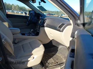 2020 Jeep Grand Cherokee Altitude with VIN 1C4RJEAG1LC102200, listed as a IAAI auction lot 41695582 with 74,843 mi miles and . Bid and sale history available at DreamBid. Image 5.