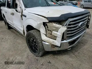 2015 Ford F-150 XLT with VIN 1FTEW1EG7FKE68370, listed as a Copart auction lot 58085685 with 107,967 mi miles and Salvage title. Bid and sale history available at DreamBid. Image 14.