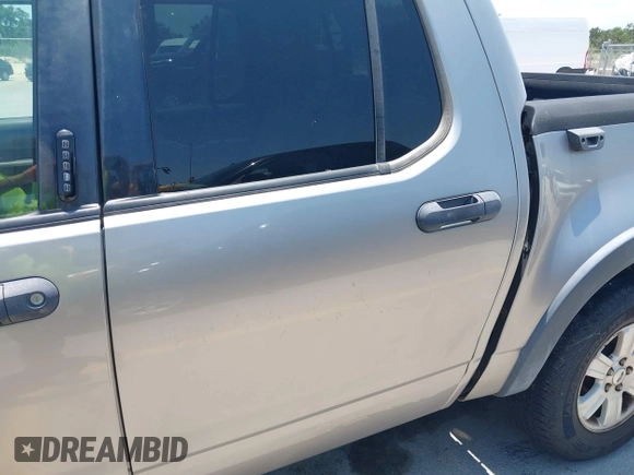 2008 Ford Explorer Sport Trac XLT z VIN 1FMEU51E28UB26894, wystawiony jako IAAI lot #42405007 z przebiegiem 194 386 mil mil oraz . Historia ofert i sprzedaży dostępna na DreamBid. Obrazek 12.