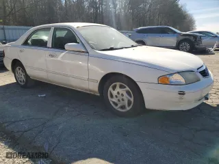 2001 Mazda 626 LX with VIN 1YVGF22C815240640, listed as a Copart auction lot 47609315 with 0 mi miles and Salvage Title. Bid and sale history available at carsss.com. Image 4.