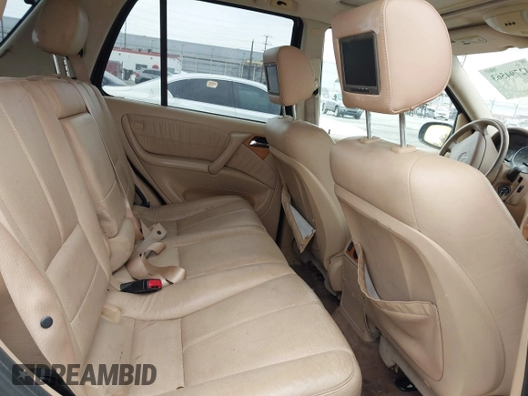 2005 Mercedes-Benz M 500 with VIN 4JGAB75EX5A532297, listed as a IAAI auction lot 42794563 with 200,481 mi miles and . Bid and sale history available at DreamBid. Image 8.