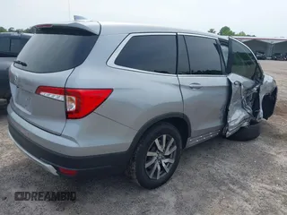 2021 Honda Pilot EX z VIN 5FNYF5H3XMB030112, wystawiony jako IAAI lot #42204148 z przebiegiem 96 182 mil mil oraz . Historia ofert i sprzedaży dostępna na DreamBid. Obrazek 4.