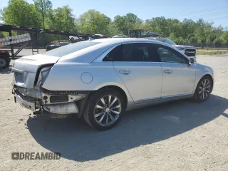 2013 Cadillac XTS Luxury с VIN 2G61P5S3XD9189744, выставлен на аукционе Copart как лот 54391535 с пробегом 132 841 миль миль и Списание • Salvage title. История ставок и продаж доступна на DreamBid. Изображение 3.