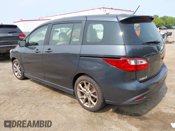 2012 Mazda 5 Touring z VIN JM1CW2CL5C0126744, wystawiony jako IAAI lot #42385667 z przebiegiem 140 150 mil mil oraz . Historia ofert i sprzedaży dostępna na DreamBid. Obrazek 3.
