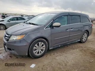 2014 Honda Odyssey EX-L with VIN 5FNRL5H68EB016363, listed as a Copart auction lot 58821115 with 115,111 mi miles and Salvage title. Bid and sale history available at DreamBid. Image 1.