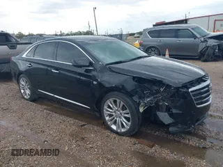 2019 Cadillac XTS Luxury with VIN 2G61M5S32K9141807, listed as a IAAI auction lot 41818444 with 84,864 mi miles and . Bid and sale history available at carsss.com. Image 1.