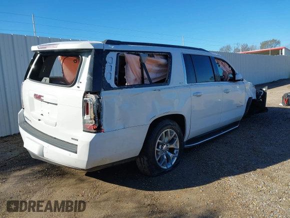 2019 GMC Yukon XL SLT with VIN 1GKS1GKC1KR335082, listed as a IAAI auction lot 41652504 with 135,824 mi miles. Bid and sale history available at carsss.com. Image 4.