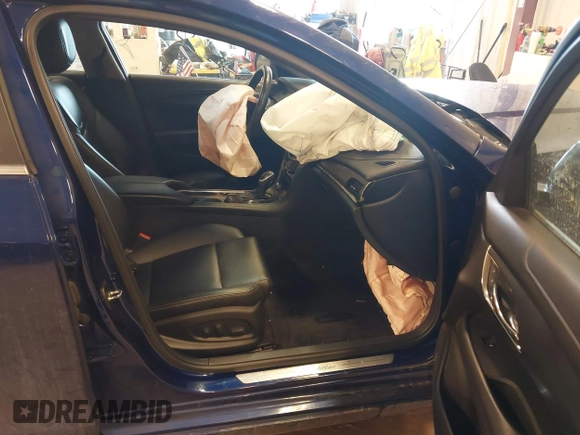 2014 Cadillac ATS Standard AWD with VIN 1G6AG5RX4E0170756, listed as a IAAI auction lot 41514974 with 126,524 mi miles and . Bid and sale history available at carsss.com. Image 5.