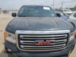 2019 GMC Canyon 4WD SLE z VIN 1GTG6CENXK1261278, wystawiony jako IAAI lot #42064295 z przebiegiem 51 786 mil mil oraz . Historia ofert i sprzedaży dostępna na DreamBid. Obrazek 6.