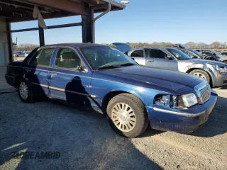 2006 Mercury Grand Marquis LS Premium with VIN 2MEFM75V76X627623, listed as a Copart auction lot 49158575 with 128,066 mi miles and Salvage Title. Bid and sale history available at DreamBid. Image 4.