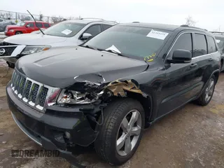 2013 Jeep Grand Cherokee Overland with VIN 1C4RJFCG1DC593890, listed as a IAAI auction lot 41264434 with 204,324 mi miles. Bid and sale history available at carsss.com. Image 16.