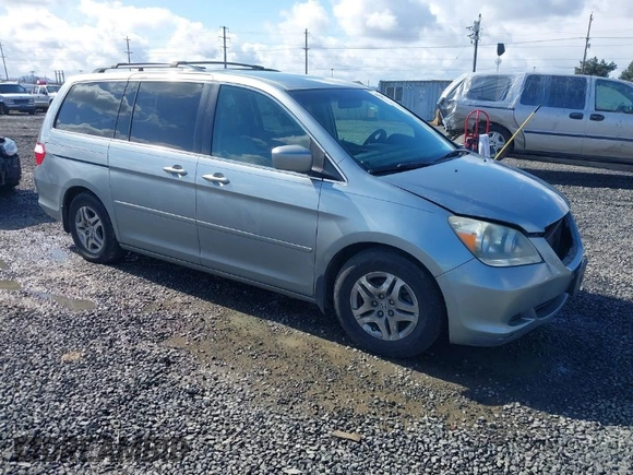2007 Honda Odyssey EX with VIN 5FNRL38457B141956, listed as a IAAI auction lot 41818619 with 160,649 mi miles. Bid and sale history available at carsss.com. Image 1.