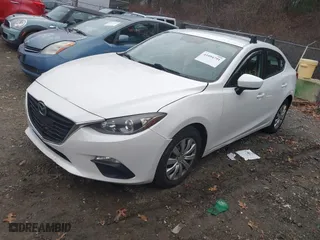 2014 Mazda Mazda3 i Sport with VIN JM1BM1U75E1130979, listed as a IAAI auction lot 41094791 with 100,518 mi miles. Bid and sale history available at carsss.com. Image 17.