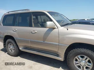 2001 Lexus LX 470 with VIN JTJHT00W613510736, listed as a IAAI auction lot 42005639 with 274,227 mi miles and . Bid and sale history available at carsss.com. Image 13.