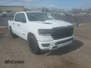 2023 Ram 1500 Laramie with VIN 1C6SRFJT3PN541901, listed as a IAAI auction lot 42156766 with 58,082 mi miles and . Bid and sale history available at DreamBid. Image 1.