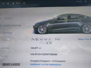 2016 Tesla Model S 90D with VIN 5YJSA1E20GF128496, listed as a IAAI auction lot 41214785 with 126,671 mi miles. Bid and sale history available at carsss.com. Image 7.