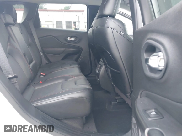 2022 Jeep Cherokee Trailhawk with VIN 1C4PJMBX1ND500729, listed as a IAAI auction lot 42235098 with 60,354 mi miles and . Bid and sale history available at DreamBid. Image 8.