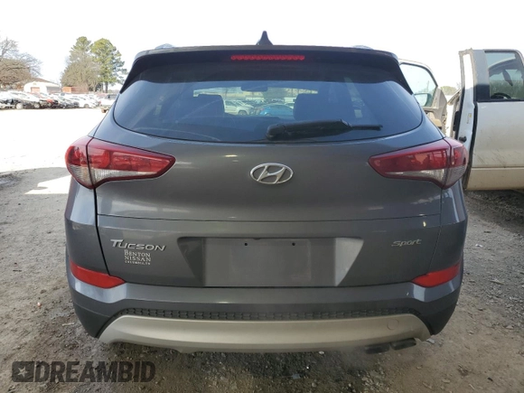 2018 Hyundai Tucson Sport with VIN KM8J33AL0JU802026, listed as a Copart auction lot 45869445 with 124,669 mi miles and Salvage Title. Bid and sale history available at carsss.com. Image 6.