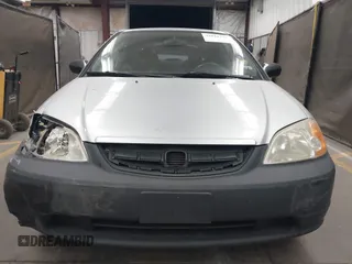 2003 Honda Civic LX with VIN 1HGEM22573L012729, listed as a IAAI auction lot 42041772 with 157,207 mi miles. Bid and sale history available at carsss.com. Image 12.