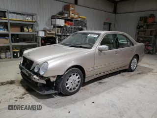 2001 Mercedes-Benz E-Class AWD with VIN WDBJF82J71X043474, listed as a Copart auction lot 45512025 with 59,571 mi miles and Salvage Title. Bid and sale history available at carsss.com. Image 1.
