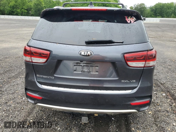 2016 Kia Sorento SX z VIN 5XYPKDA51GG152979, wystawiony jako Copart lot #57942165 z przebiegiem 189 283 mil mil oraz Szkoda całkowita • Salvage title. Historia ofert i sprzedaży dostępna na DreamBid. Obrazek 6.