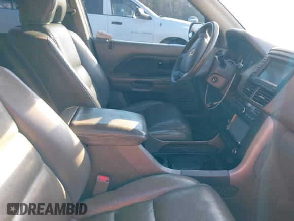 2006 Honda Pilot EX-L with VIN 5FNYF18766B026721, listed as a IAAI auction lot 41690993 with 219,473 mi miles and . Bid and sale history available at DreamBid. Image 5.