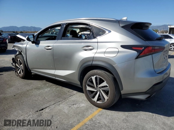 2021 Lexus NX 300 with VIN JTJGARBZ7M2191564, listed as a Copart auction lot 57974155 with 52,499 mi miles and Salvage title. Bid and sale history available at DreamBid. Image 2.