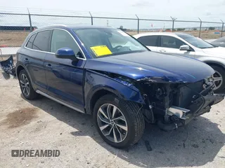 2021 Audi Q5 Premium z VIN WA1AAAFY7M2004975, wystawiony jako IAAI lot #42190283 z przebiegiem 56 810 mil mil oraz . Historia ofert i sprzedaży dostępna na DreamBid. Obrazek 1.
