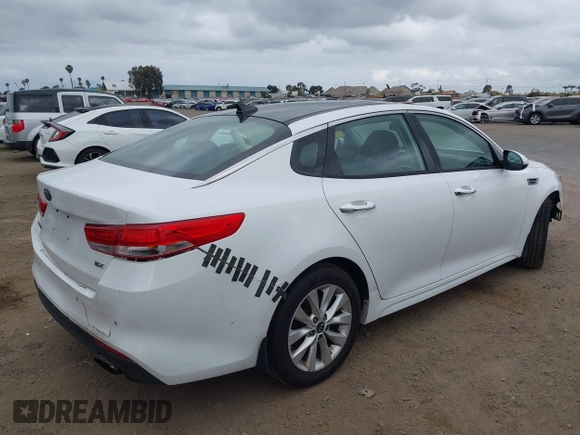 2016 Kia Optima EX with VIN 5XXGU4L31GG086203, listed as a IAAI auction lot 42128099 with 157,988 mi miles. Bid and sale history available at carsss.com. Image 4.