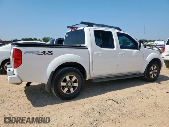 2012 Nissan Frontier Pro-4X with VIN 1N6AD0EV3CC468057, listed as a Copart auction lot 60432675 with 100,088 mi miles and Salvage title. Bid and sale history available at DreamBid. Image 3.