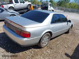 1999 Cadillac Seville Luxury SLS with VIN 1G6KS54Y2XU925322, listed as a IAAI auction lot 41889695 with 150,587 mi miles. Bid and sale history available at carsss.com. Image 4.